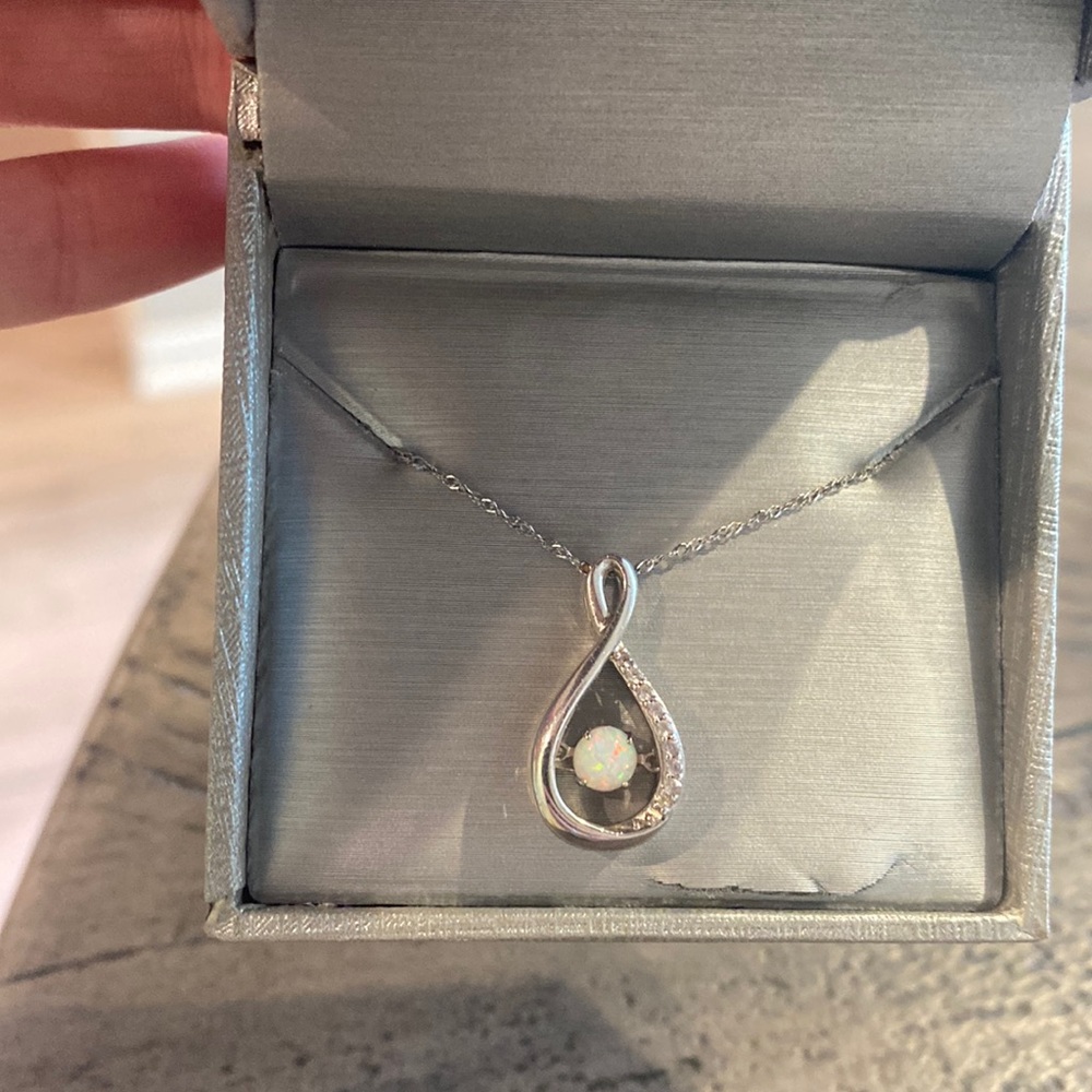 Diamond and opal Zales necklace on white gold chain